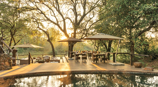 Dulini main deck with Lounge and Dining area. Dulini Safari Lodge is located in the Sabi Sand Game Reserve