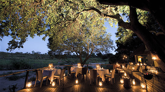 Dine on the Main Deck at Lion Sand's Ivory Lodge in the Sabi Sand Private Game Reserve, South Africa
