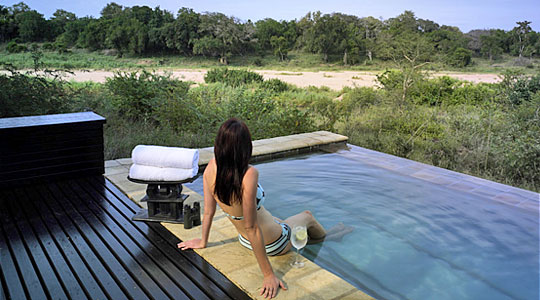 Relax in your Villa's private plunge pool at Lion Sand's Ivory Lodge in the Sabi Sand Private Game Reserve, South Africa