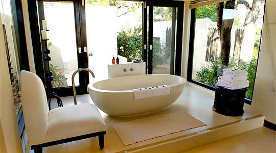 Villa's luxury bathroom at Lion Sand's Ivory Lodge in the Sabi Sand Private Game Reserve, South Africa